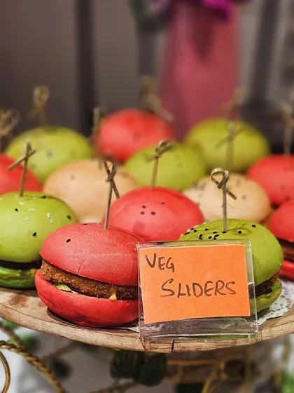 My colorful mini veg sliders are always a party favorite. These bite-sized burgers are not just delicious but also a feast for the eyes, perfect for guests to enjoy while mingling.
