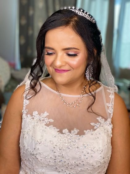 Happy brides are the prettiest. This is a completely unedited, filter free photo of my lovely Catholic bride, showing her natural glow and the flawless finish of her makeup. Go ahead and zoom in.