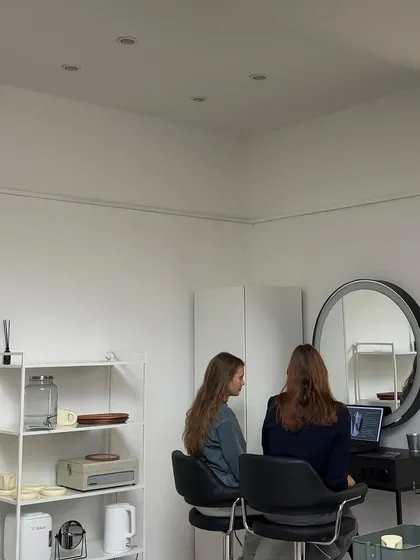 A theoretical training session in progress. Our instructors are dedicated to sharing their deep knowledge of both the art and science of beauty services.