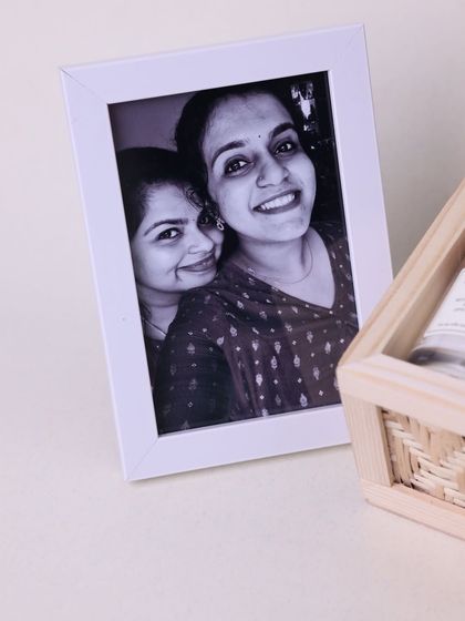 A black and white photo in a simple white frame, offering a classic and timeless way to personalize a gift for a loved one.
