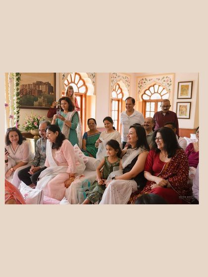 The family watching on. Capturing the reactions of loved ones is just as important as focusing on the couple, as it adds depth and context to the story.