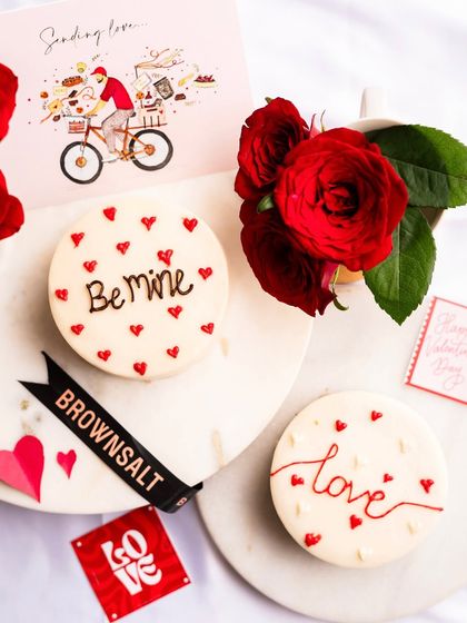 My collection of Valentine's bento cakes, featuring "Be mine" and "love" messages. They are perfect for gifting and sharing.