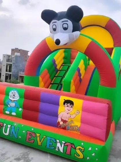 A compact 9x13 foot 2-slider bouncy featuring Chhota Bheem and Doraemon. It's a popular choice for themed birthday parties and small school events.