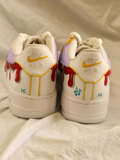 The back of the dripping paint AF1s, where I added the clients' initials and some musical notes to make the design even more personal.