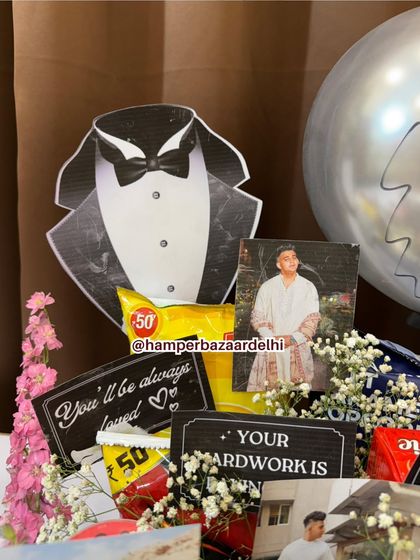 A tuxedo cutout, his favorite chips, and loving notes. This hamper is all about celebrating the man of the moment in his own unique style.