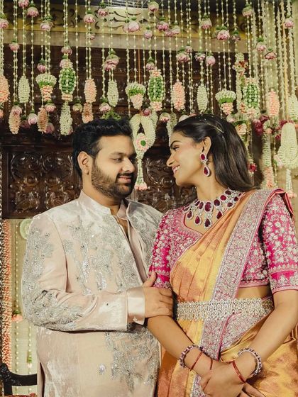 A lovely couple shot from the Pelikuthuru ceremony. His elegant sherwani is a perfect match for her traditional yet modern saree look.