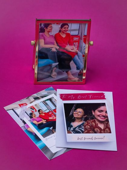 The personalized photo frame and custom cards created for the best friend hamper, turning memories into treasured keepsakes.