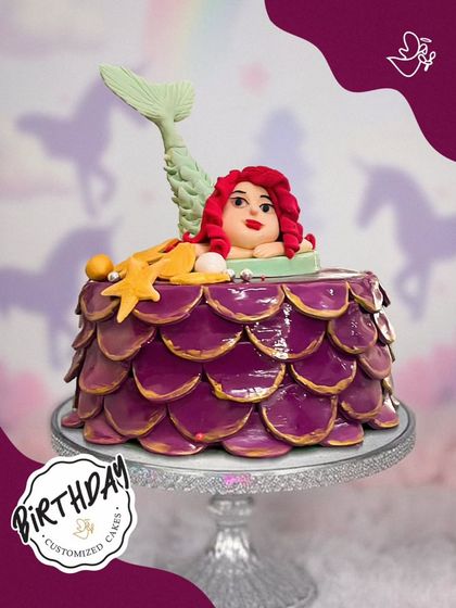 A glamorous mermaid cake with shimmering purple scales and a beautifully crafted tail. This cake brings a touch of underwater fantasy and style to any birthday party.
