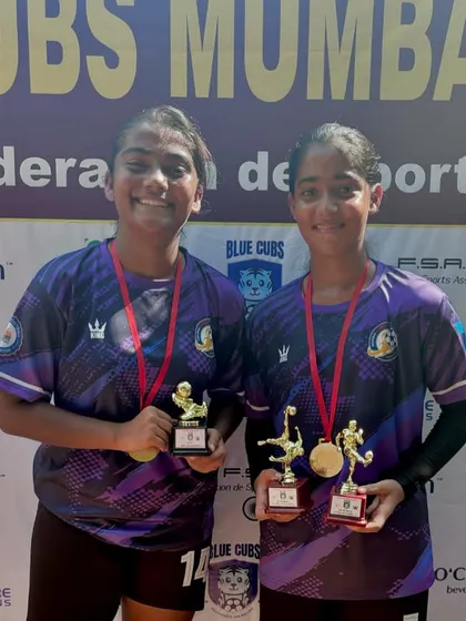 Camryn and Sanvi receiving their Best GK and Best Player/Golden Boot awards at the Blue Cubs tournament.