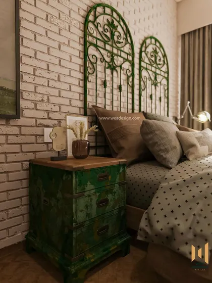 Another angle of the vintage-inspired bedside table against the textured brick wall.