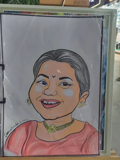 A beautiful color caricature of a woman, displayed on my easel. The color adds warmth and brings out her happy expression.