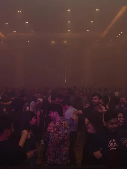 A packed room at our New Year's Eve bash, filled with atmospheric smoke. I use effects to build a sense of anticipation and excitement throughout the night.