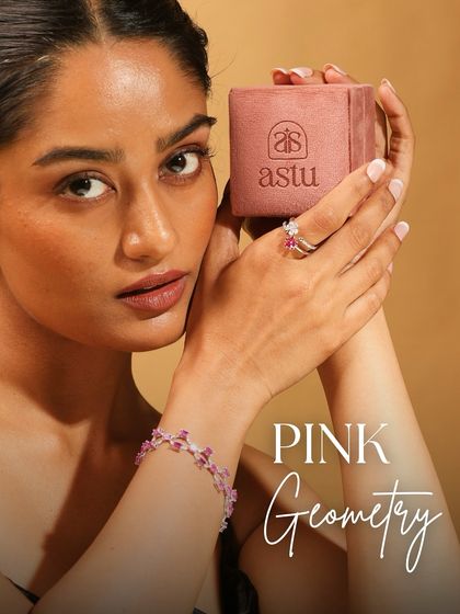 The Pink Geometry set, featuring a bracelet of octagon-cut pink sapphires and baguette diamonds, worn with the matching Two Flowers ring. A study in modern elegance.
