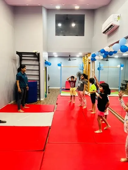 Here is a glimpse into one of our kids' dance and fitness sessions in full swing. We focus on creating an active, engaging environment where an instructor guides children through each step, ensuring everyone feels included and confident on the dance floor.