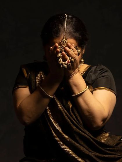 This evocative photo from the 'Quest' series captures a moment of sorrow and introspection. The production delves into deep emotional landscapes to tell its stories of survival.