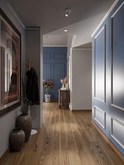 Even transitional spaces like hallways deserve careful design. This render shows a beautifully lit corridor with classic wall molding, rich hardwood floors, and thoughtfully placed decor, proving that every part of your home can be designed with intention.