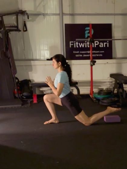 A low lunge, a fundamental stretch for the hip flexors and quads.