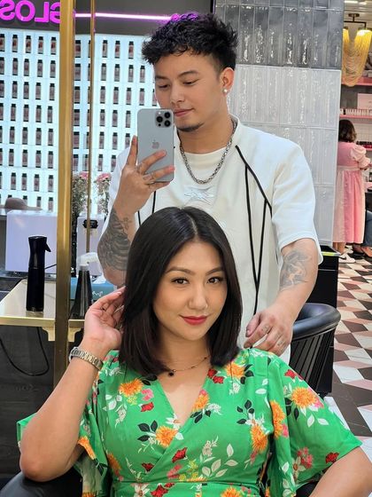 Everything feels better after a haircut. This client is rocking a new medium-length bob with soft layers, a versatile and stylish choice.