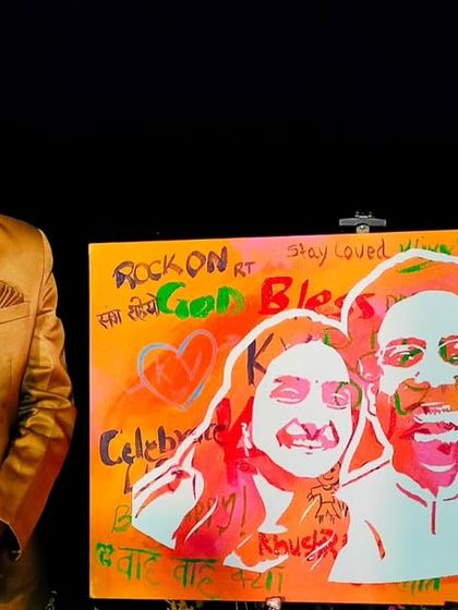 Here I am with the finished Magic Portrait. It's a combination of everyone's good wishes and my art, resulting in a colorful, meaningful, and personal keepsake for the couple.