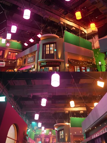 A wide view of the multi-level street market set for the Patanjali ad, showcasing the scale and complexity of the lighting design.