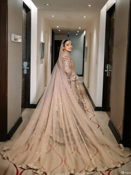 A collection of professional shots of my bride Shachi. Her dusty rose lehenga with a long trail was pure magic. We did a soft glam look with a subtle smokey eye to match the grandeur.