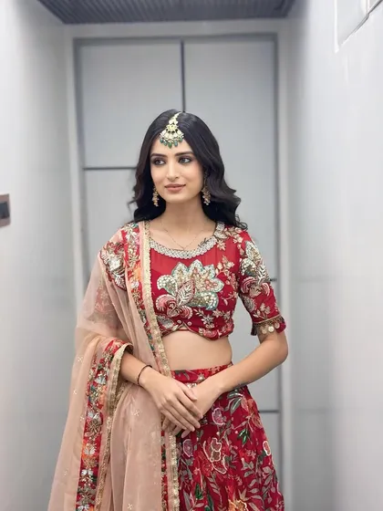 The full view of this timeless festive look. The soft curls and natural makeup make it perfect for any celebration.
