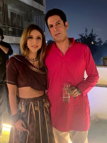 With a dear friend at a party. It's always great to catch up with people I've known for years.