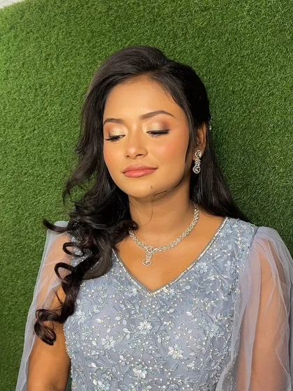 Makeup that feels and looks like skin. This close-up shows the soft, blended eyeshadow and the natural-looking base that enhances her features without being heavy.