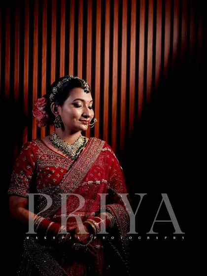 A bridal portrait is more than just a photo; it's about capturing the bride's essence on her big day. I use dramatic lighting and focused composition to create timeless, elegant portraits that highlight her beauty and emotion.