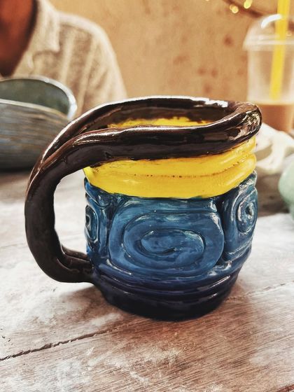 Look at this absolutely beautiful collection from two students who just completed their beginner's course. From a quirky coiled mug to patterned plates and wheel-thrown bowls, their creativity and joy shine through each piece.