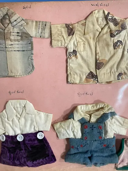 A collection of miniature tailored shirts and shorts from my mother's 1963 journal. One even has tiny embroidered details on it.