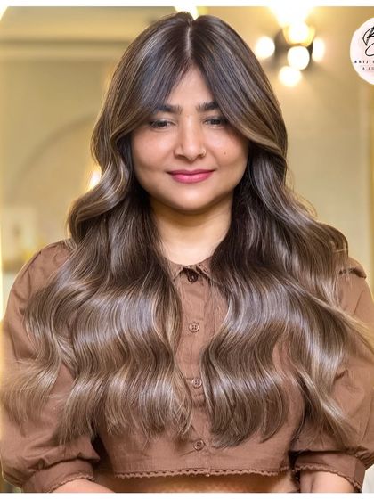 A final shot of the stunning ash blonde transformation, a perfect blend of bold and bright.