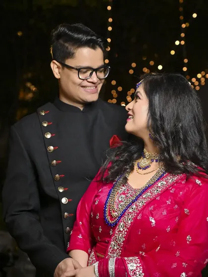 A close-up shot from an evening pre-wedding session, highlighting the couple's joy and affection.