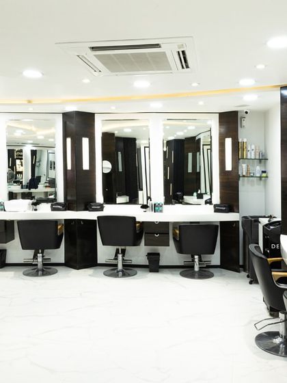 This is the main styling floor of our brand-new salon at Kemps Corner. The clean lines, modern decor, and professional setup create an environment where our stylists can work their magic.
