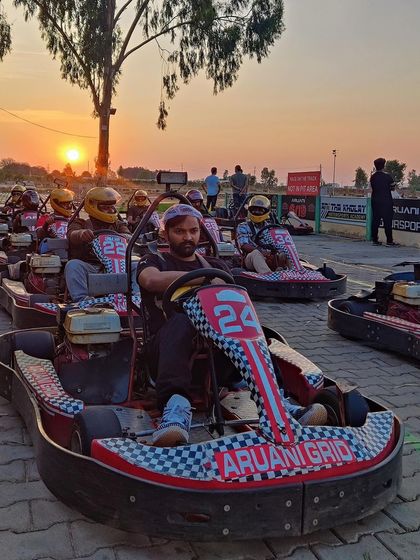 A beautiful sunset view from the pit lane as a group gets ready for their session. It's the perfect way to end the day with your crew.