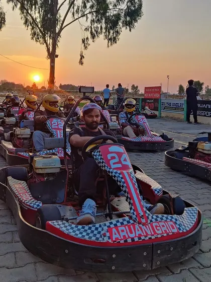 A beautiful sunset view from the pit lane as a group gets ready for their session. It's the perfect way to end the day with your crew.