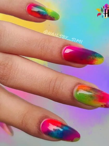 Holi hai! My nails got to enjoy the festival of colors this year with this vibrant, splashy design that looks like real Holi colors.