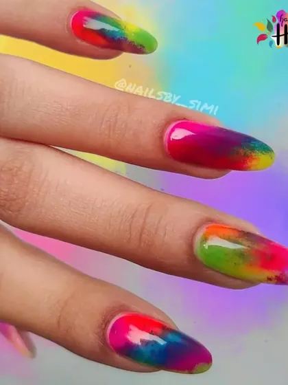 Holi hai! I had so much fun creating these vibrant, colorful nails that look like they’ve been splashed with holi colors.