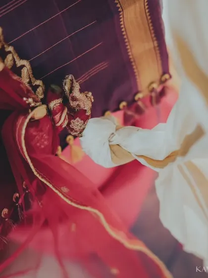 A detail shot focusing on the symbolic tying of the knot in a South Indian wedding. I believe these small, significant details are just as important as the grand moments.
