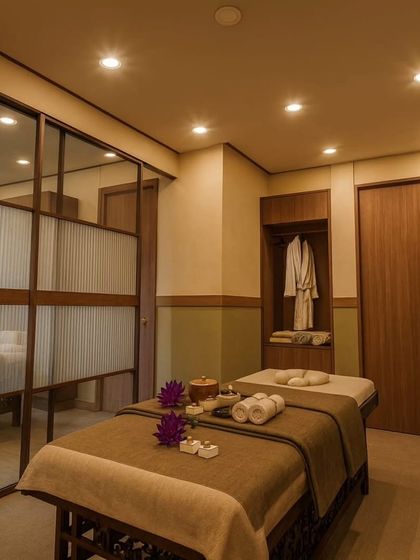 Privacy and serenity are paramount in a spa. We used frosted glass panels and warm wood tones in this treatment room to create a sense of seclusion without making the space feel small or enclosed.