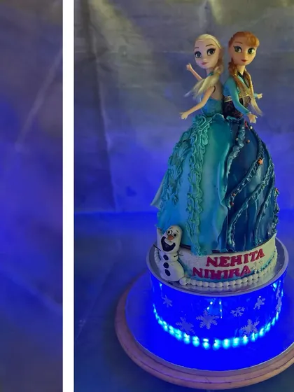 A full view of the illuminated Frozen cake for twin girls, Nehita and Nihira.