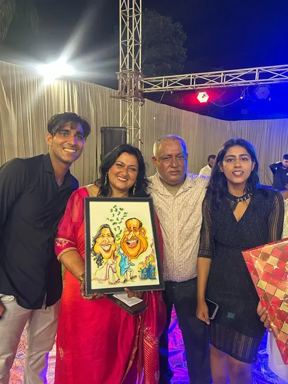 This is why I do what I do! Seeing the joy on a family's face when they receive their custom caricature is the best part of my job. Their smiles make every hour behind the pen totally worth it.