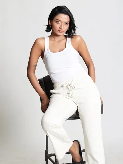 A relaxed, full-length pose. This shows the versatility of a clean beauty look, perfect for everything from a corporate headshot to a casual lifestyle shoot.