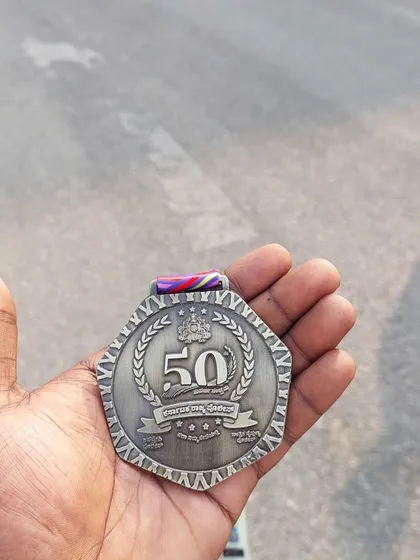 The Karnataka State Police Golden Jubilee Run medal, celebrating 50 years. A unique memento from a memorable race.