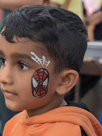 A classic Spiderman mask design, a must-have for any superhero-themed party.