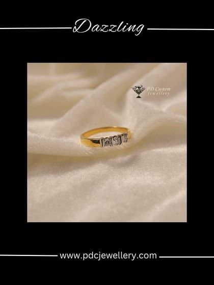 A dazzling three-stone diamond ring for men, set in 18kt hallmarked gold. This is a classic, masculine design that is both stylish and timeless.