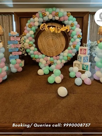 Welcoming a new baby is a joyous occasion. We design adorable baby shower and first birthday decorations, like this "Oh Baby" theme with soft pastel balloon wreaths, custom blocks, and cute baby-shaped foil balloons.