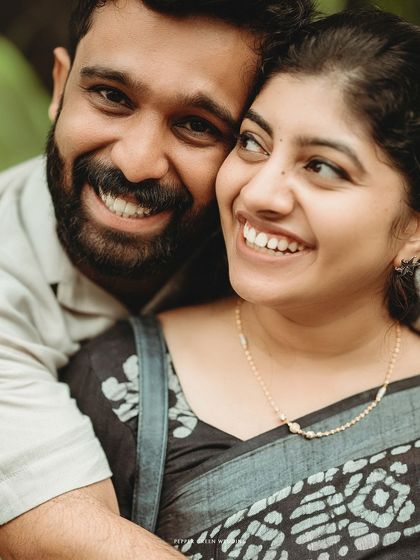 A close-up of the couple's happy smiles, capturing the warmth and affection they share during their Fort Kochi pre-wedding shoot.