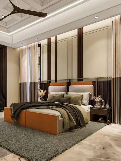 This luxurious bedroom design features a harmonious blend of warm, soothing colors like rich taupes, soft creams, and muted golds. The coffered ceiling and paneled walls add architectural depth, while the plush textiles create a cozy and tranquil ambiance.