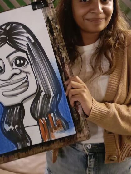 A guest at Mountain High with her finished portrait.